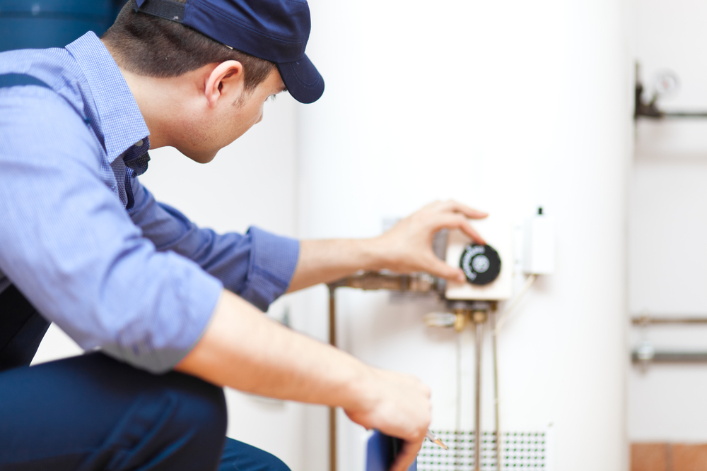 plumber servicing an hot-water heater san francisco