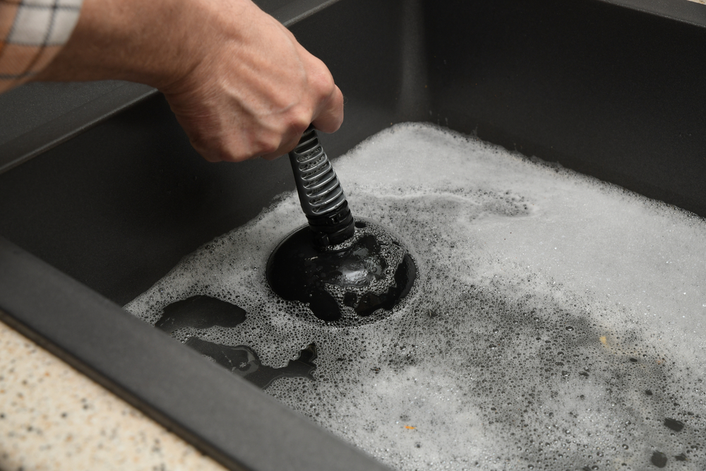 Overflowing kitchen sink, clogged drain in san francisco