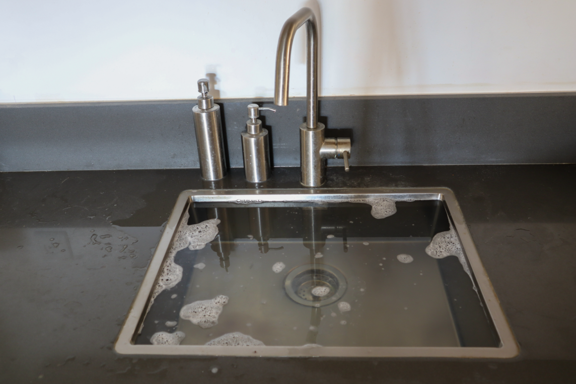 kitchen sink overflowing clogged drain